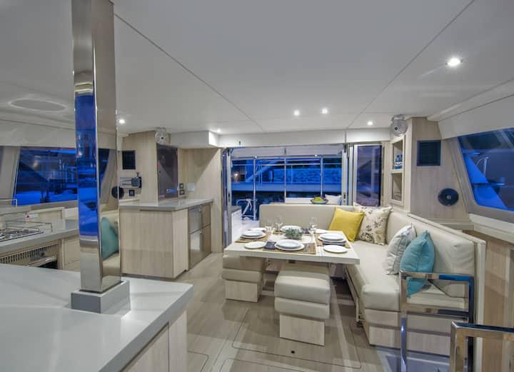The bright interior saloon and galley